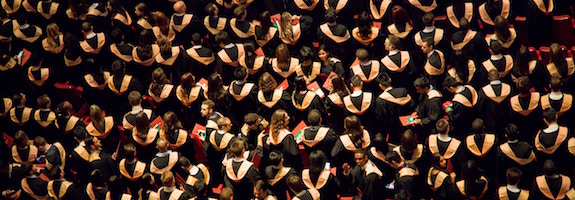 Group of graduates in caps and gowns